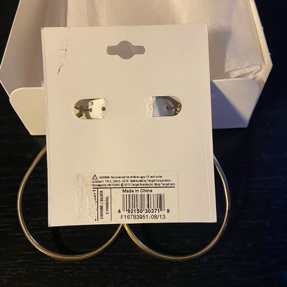 NWT Gold oval hoop earrings. 2 1/4 inches long. Nickel Free. - Picture 2 of 3